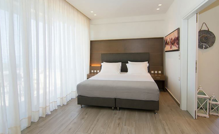 Interior Design "Prima Vista Hotel" bedroom with king bed